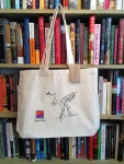 between the lines tote bag